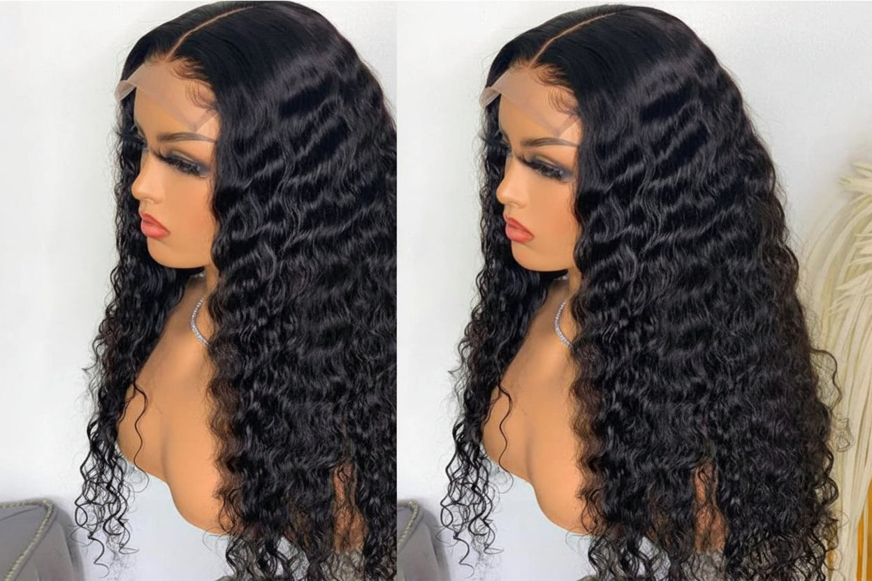 Woman wearing a black curly wig with a plain background